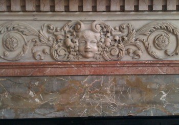 marble decoration on a fireplace